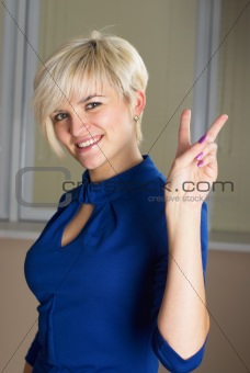 Girl with victory gesture