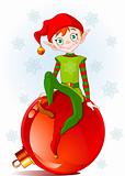 Elf sitting on Christmas ball
