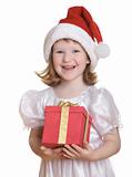 Baby girl in Santa's hat holding her Christmas present
