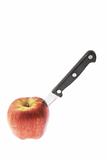 Red Apple with Knife