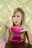 Retro woman breakfast eating corn flakes