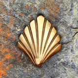 Saint James way shell golden metal on streets