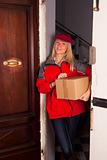 Female Courier at the Door with a Box