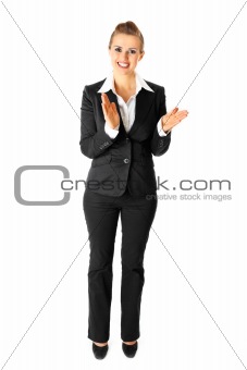 Full length portrait of applauding modern business woman 
