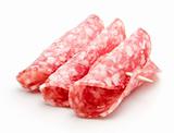 Slices of Salami isolated over white