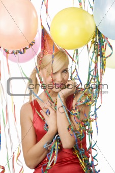 red dressed girl in party with balloons and ribbons