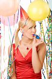 portrait of girl in red dress enjoying a party  with balloons