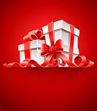gift in box with red ribbon and bow