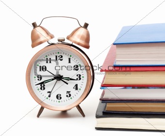 clock and books
