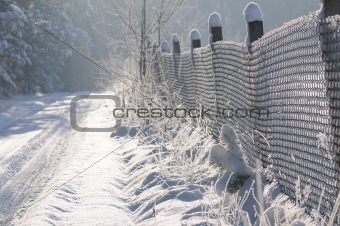 Countryside path covered with snow