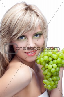 young girl with grape