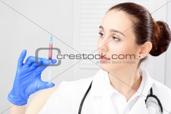 Medical - Female Nurse Looking In Microscope