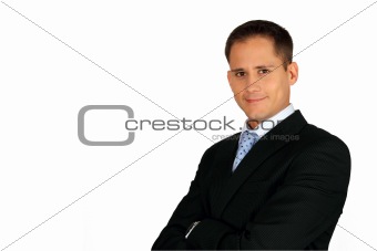 Portrait of a handsome young businessman with arms crossed