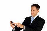 Young handsome business man using a touchscreen smartphone
