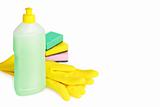 Rubber gloves, cleaning fluid and sponges isolated on white