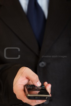 Mobile phone in man hand. Mobile communication.  Close-up.
