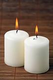 Two burning candles