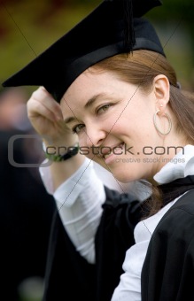 female graduating at university