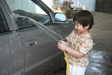 Kid washing car