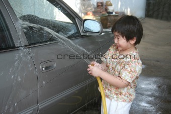 Kid washing car