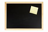 Chalkboard with yellow note