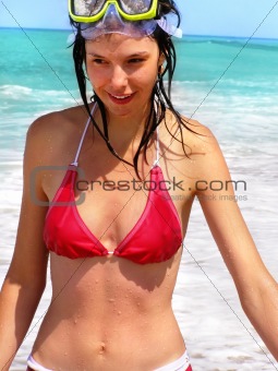 Young happy girl smiling on sea background
