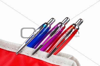 Three pens in a pencil case