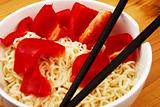 Chinese noodles with chop sticks