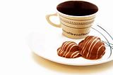 Cup of coffee with chocolate cookies