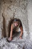 crawling in rock tunnel
