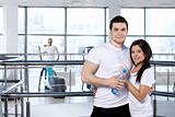 Young couple in sports club