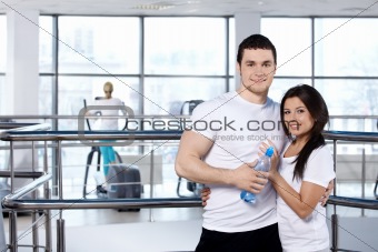 Young couple in sports club