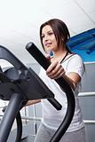 The girl on a exercise machine