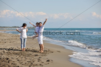 happy family playing  on beach