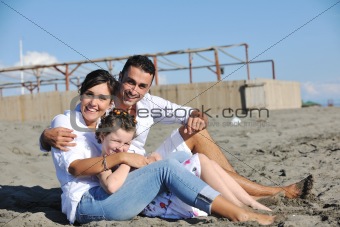 happy young  family have fun on beach