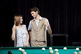 Couple in a billiard room