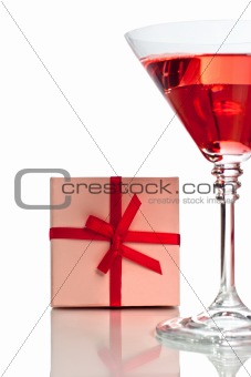 Red cocktail with gift box