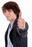 young man smiling, with thumb up, isolated on white, studio shot