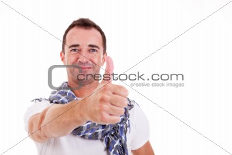 handsome man with thumb raised as a sign of success, isolated on white background. studio shot