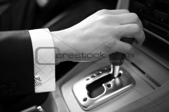 Hand of the driver of the car 