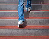 man walking up a staircase