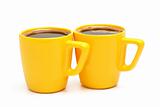 two yellow mugs