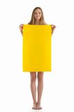 Young woman with yellow sheet of paper