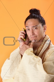 Robed Asian Man