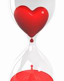 Hourglass with heart and blood closeup 