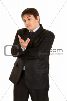 Young businessman with surprised face

