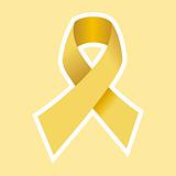 Cancer Ribbon in Gold. Yellow Background