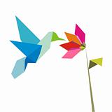 Origami flower and hummingbird on white