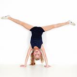 Girl child performing gymnastics