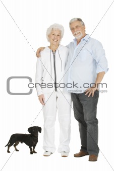 elderly couple with a dachshund